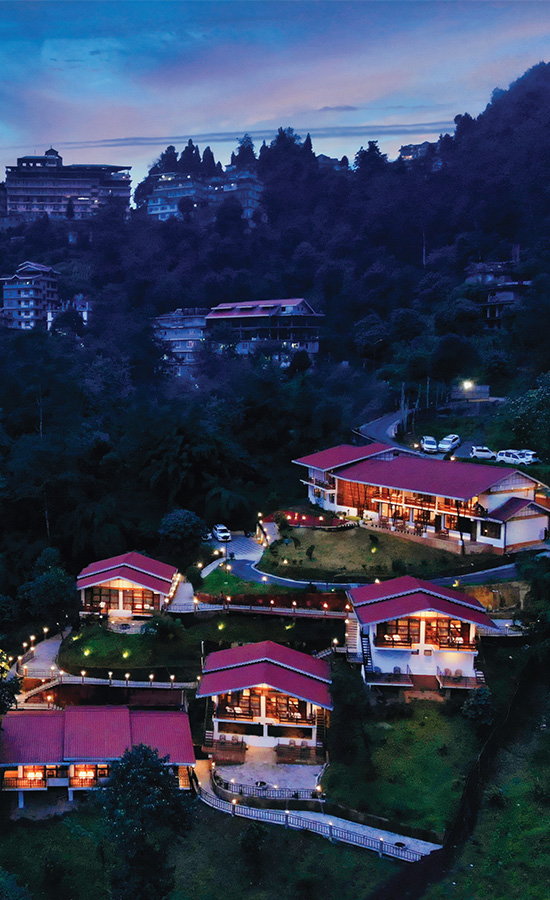 Aerial view of Kaya Gantavya Resort & Spa at dusk, Pelling, Sikkim